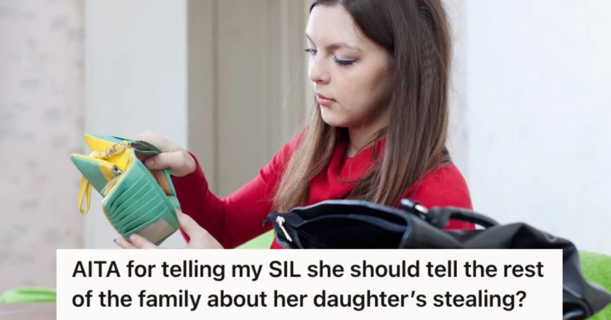 girl holding a green wallet