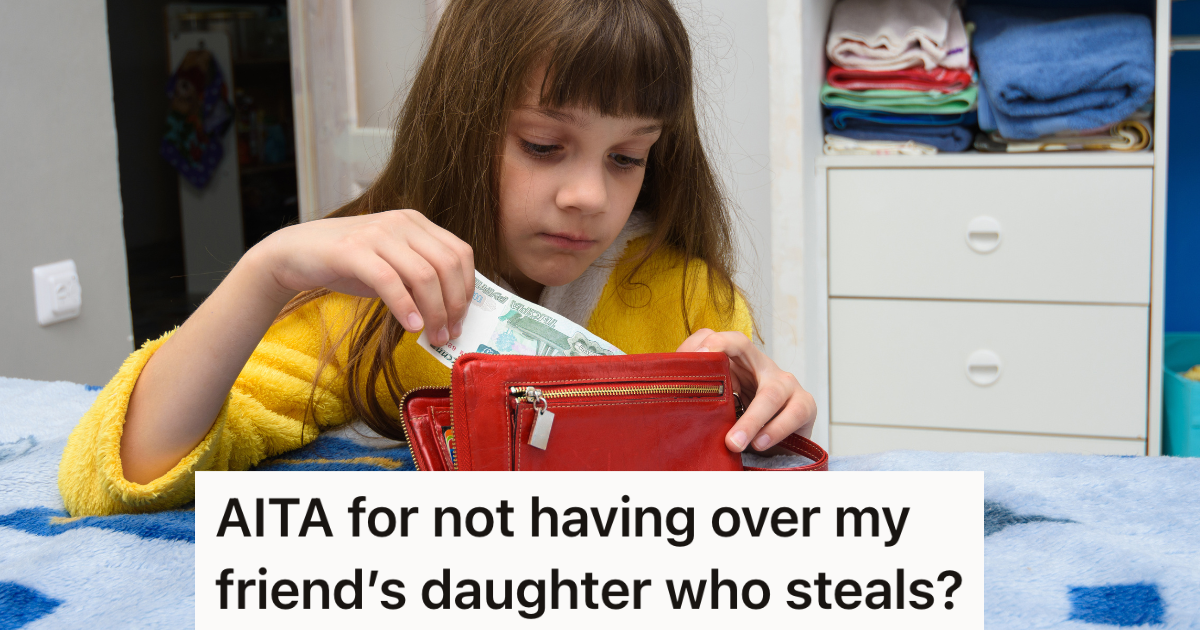 young girl taking money out of a red wallet