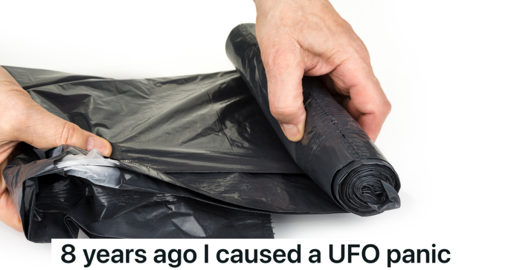 closeup of hands unrolling a black trash bag