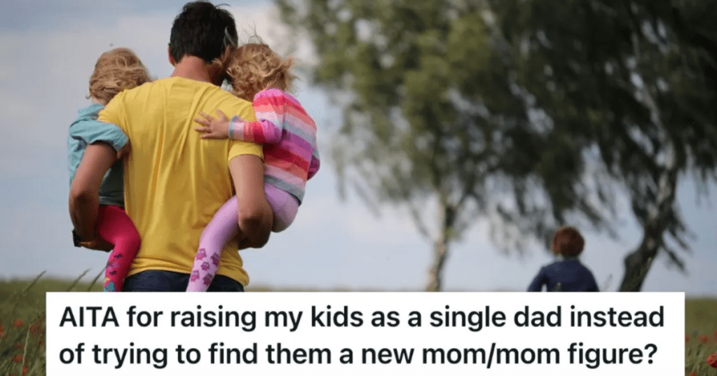 dad carrying two little kids outside