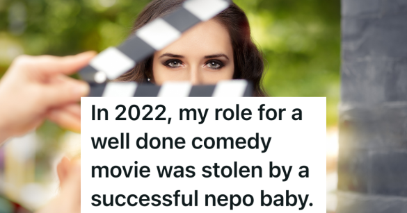 woman's face behind a movie slate