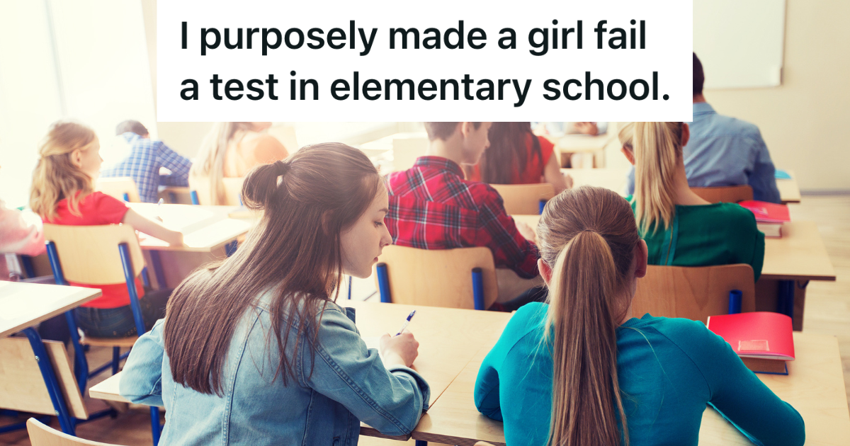 girl looking at another girl's test at school