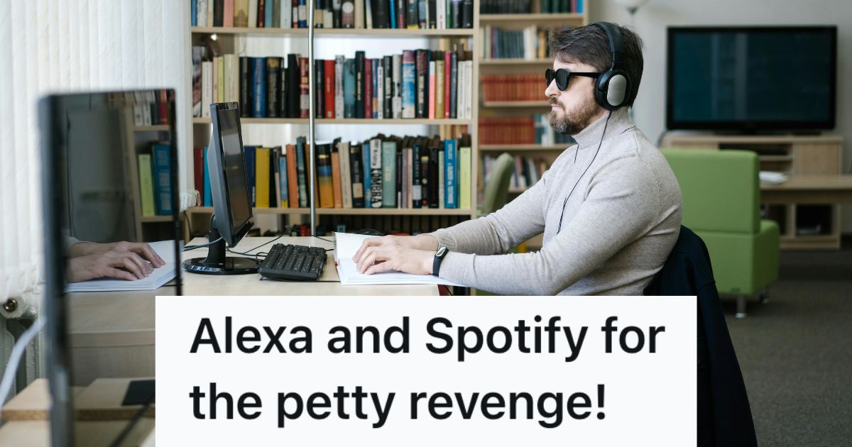 Man listening to headphones at the computer