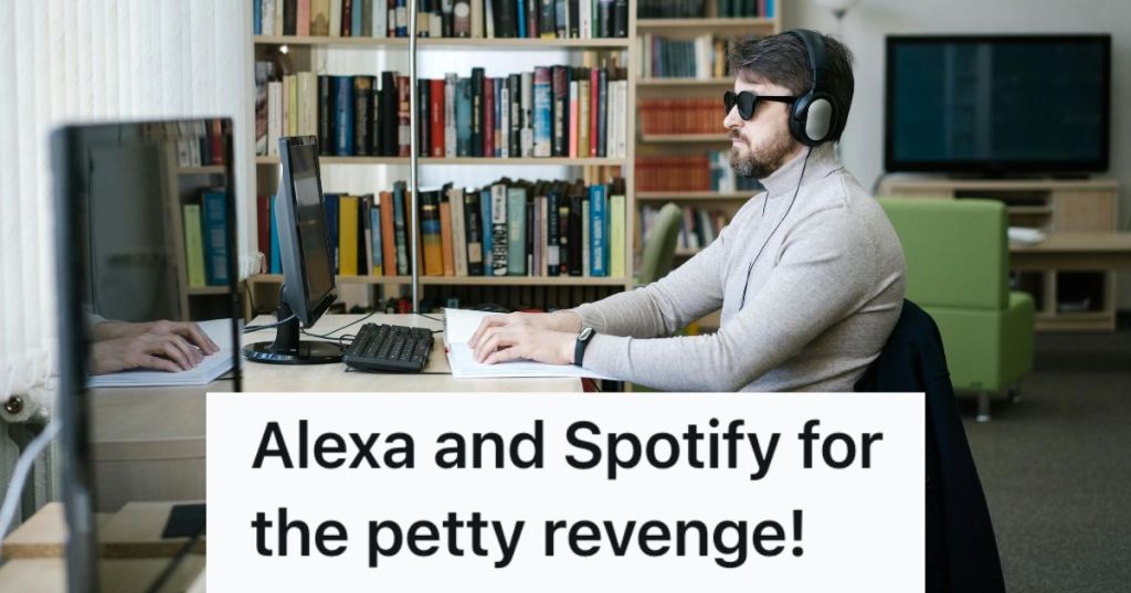 Man listening to headphones at the computer