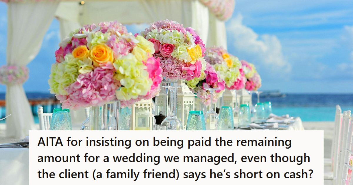 Brightly colored flowers adorning a wedding table by the beach