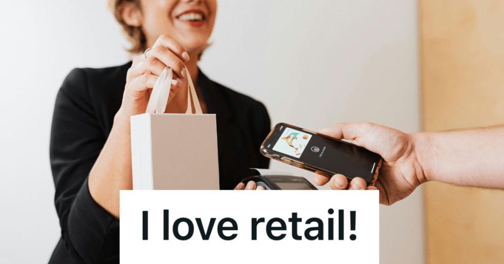 female employee handing customer a bag