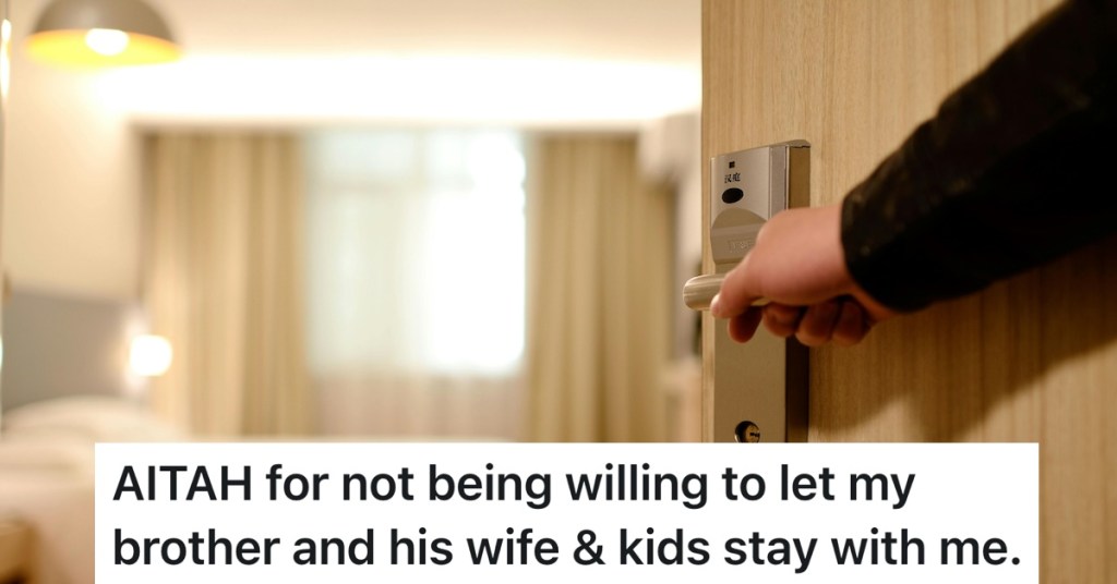 person opening up a room to a hotel