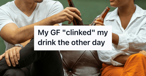 man and woman clinking beer bottles