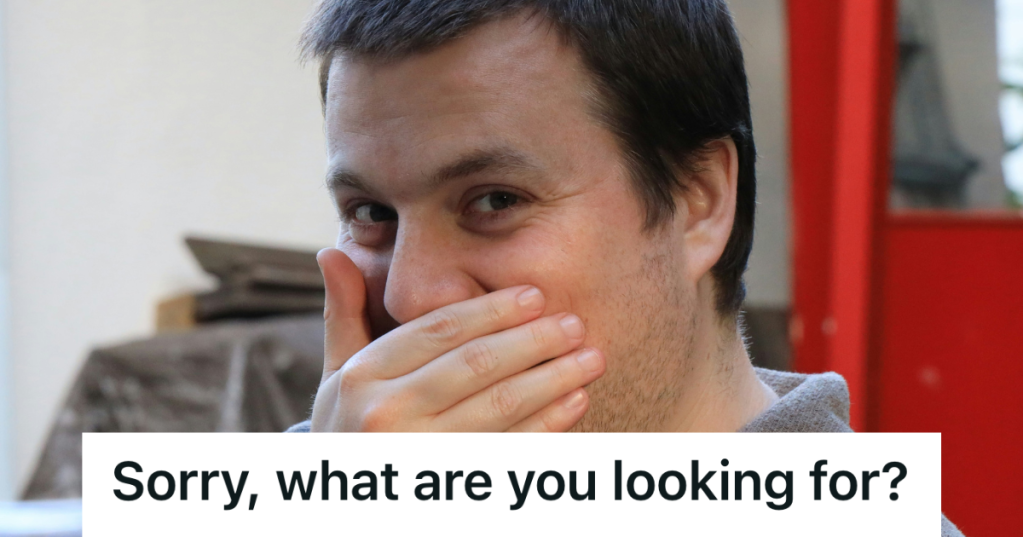 man giggling at his coworker