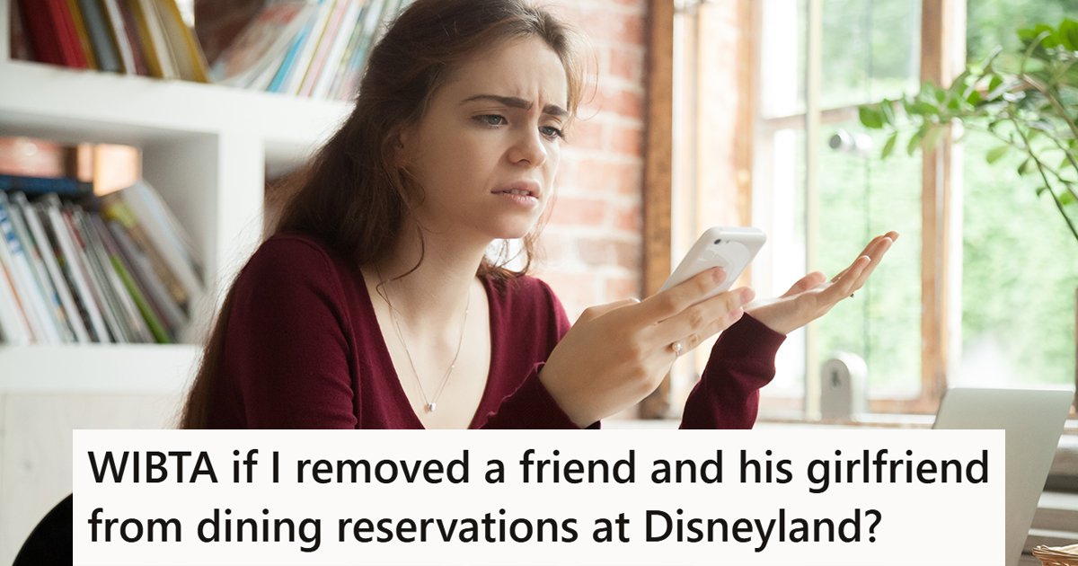 A frustrated woman looking at a phone