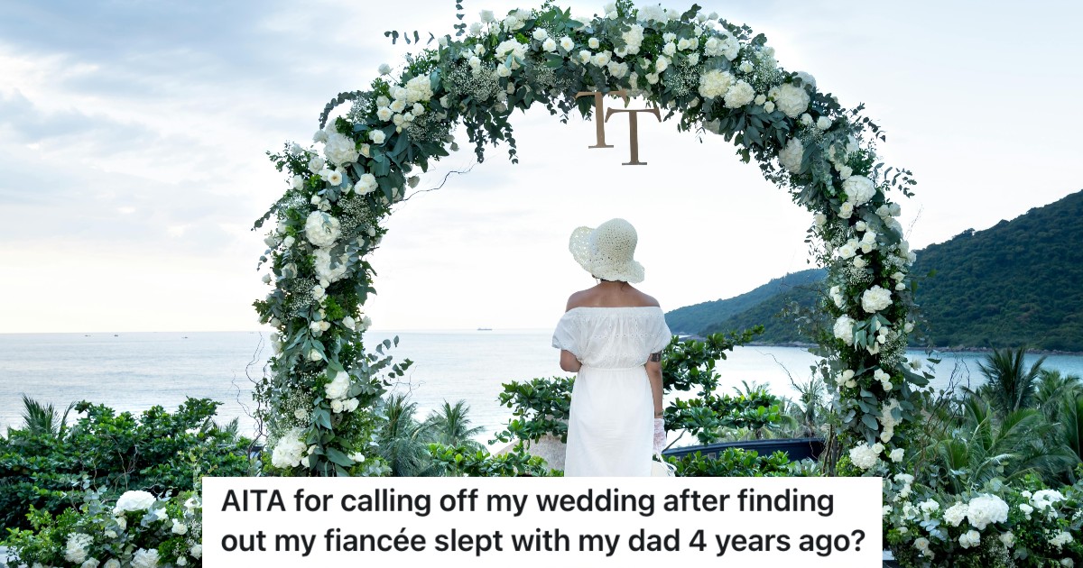 woman standing alone below wedding arch