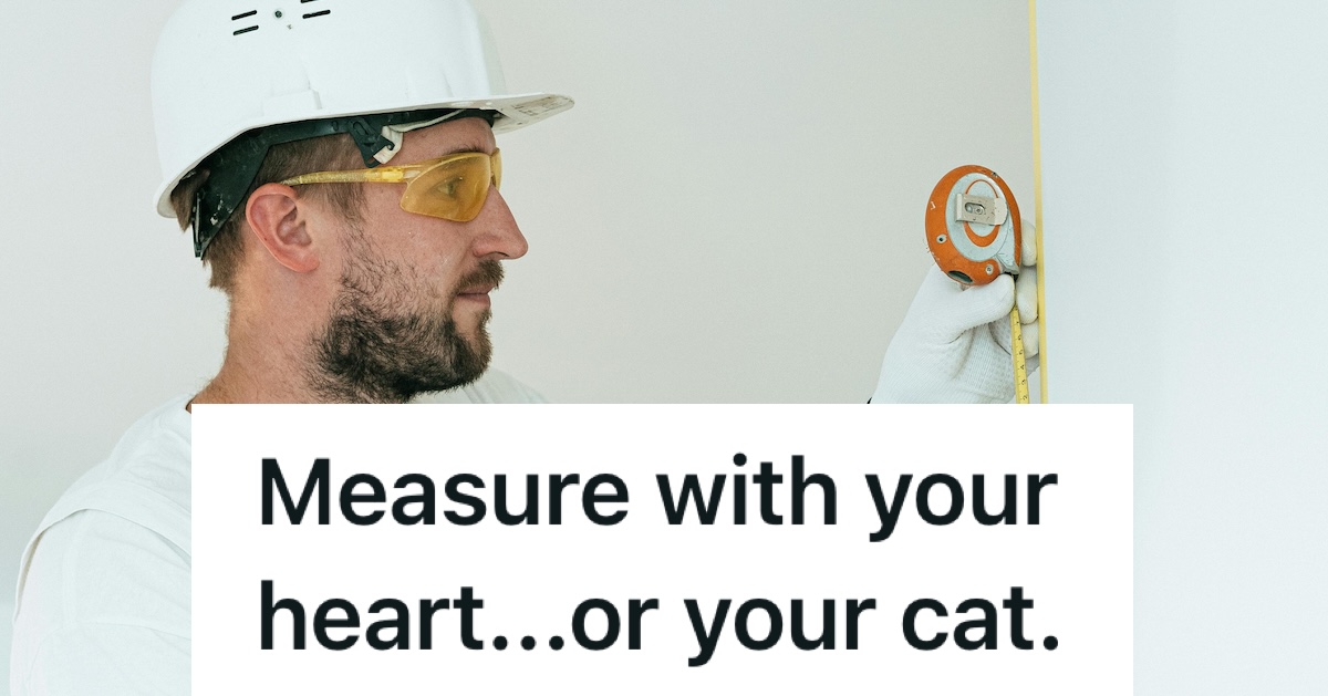 man in hardhat using a measuring tape