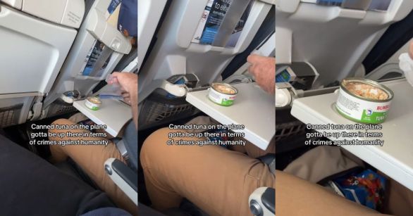 A man eating tuna on an airplane