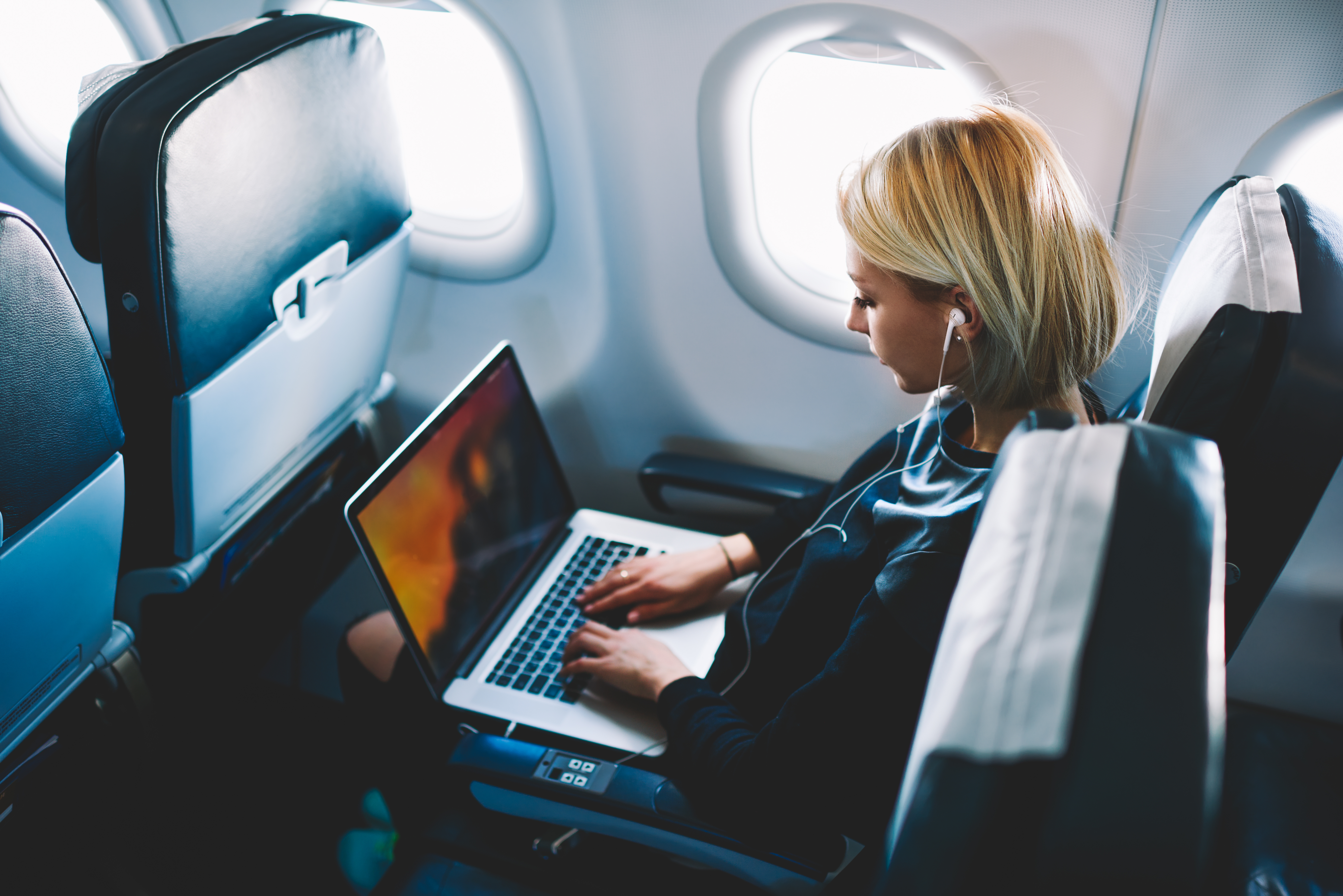 woman working on airplane