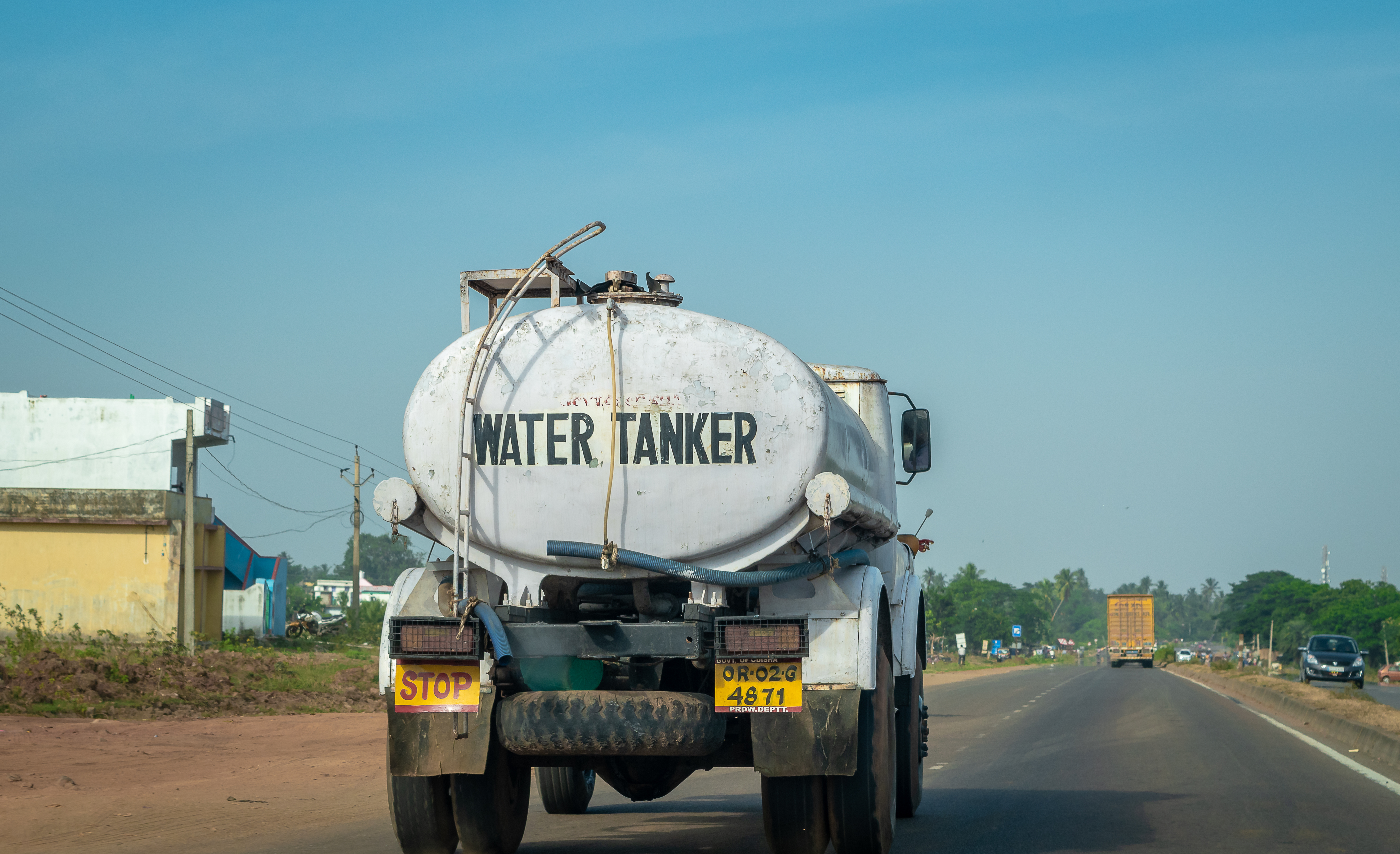 water tanker dispersing water