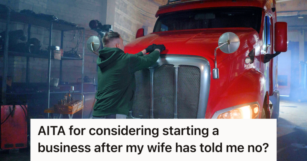 trucker washing a big red semi truck