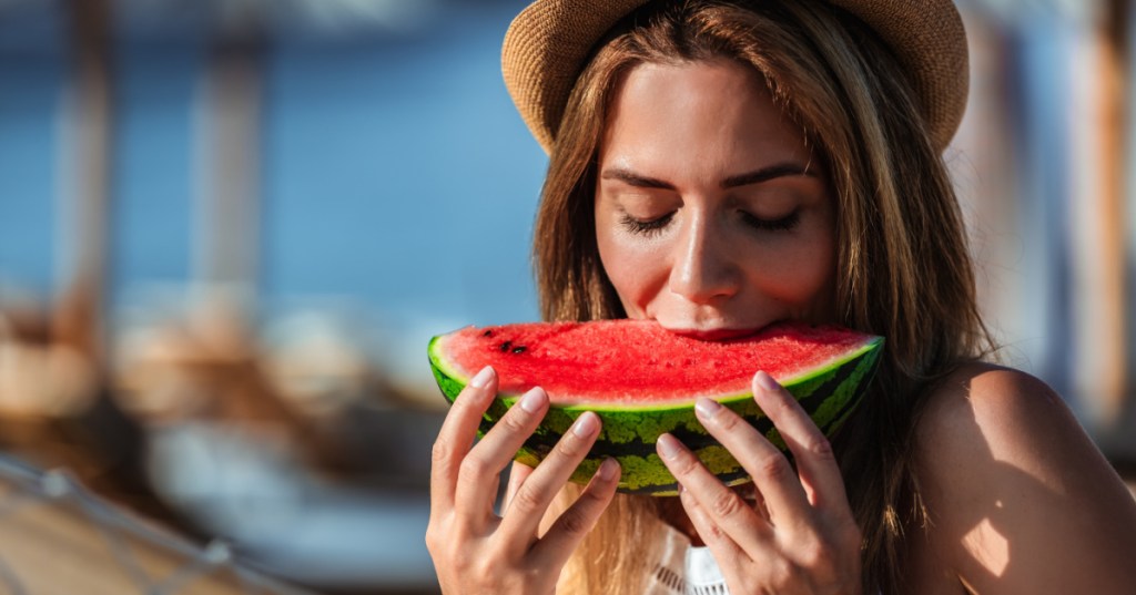 woman eating watermelon