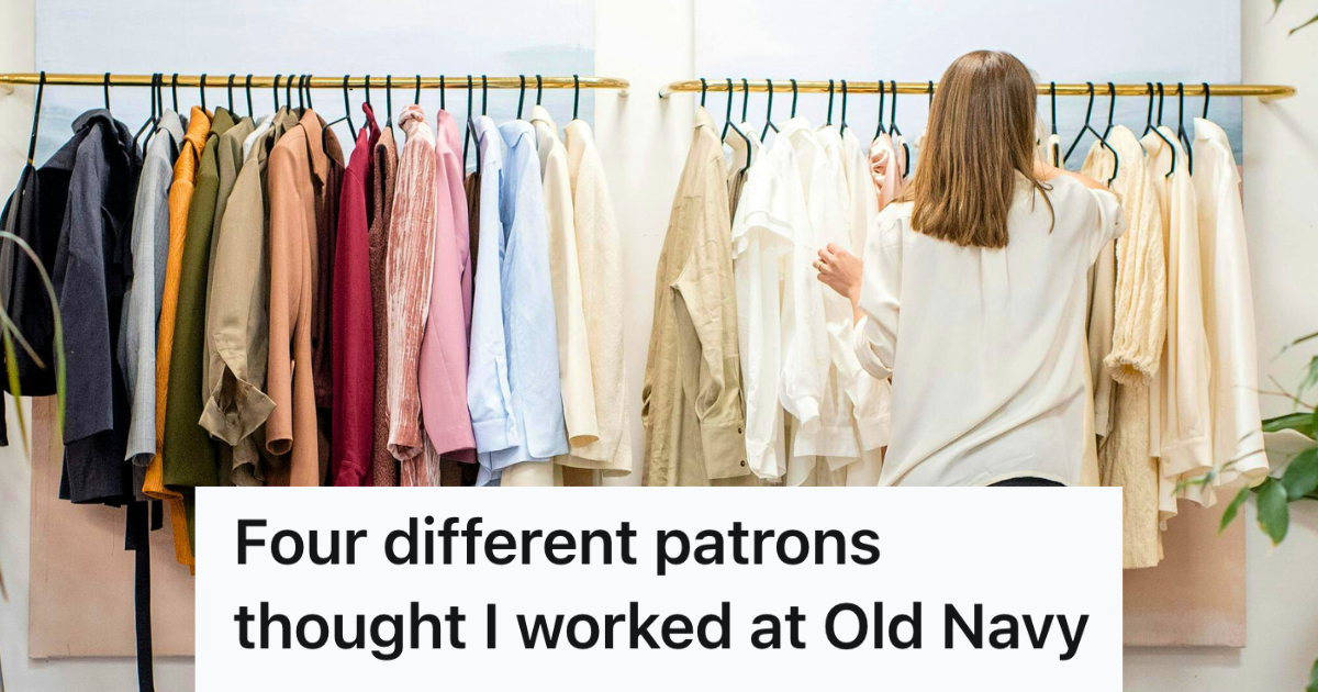woman looking through rack of clothes