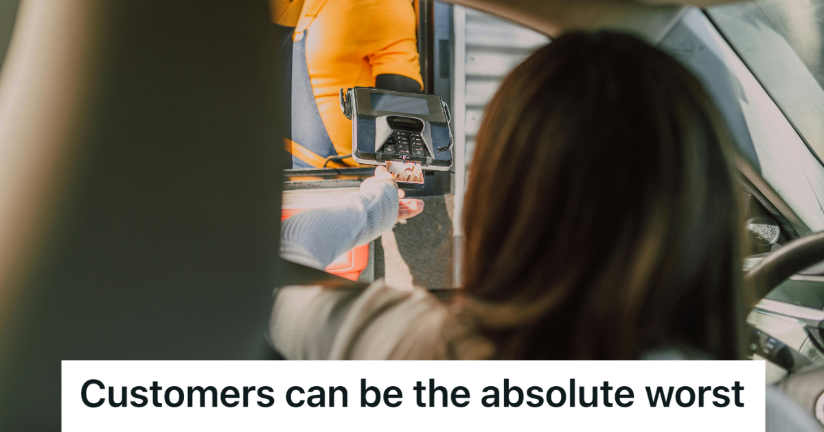 woman paying at a drive thru window