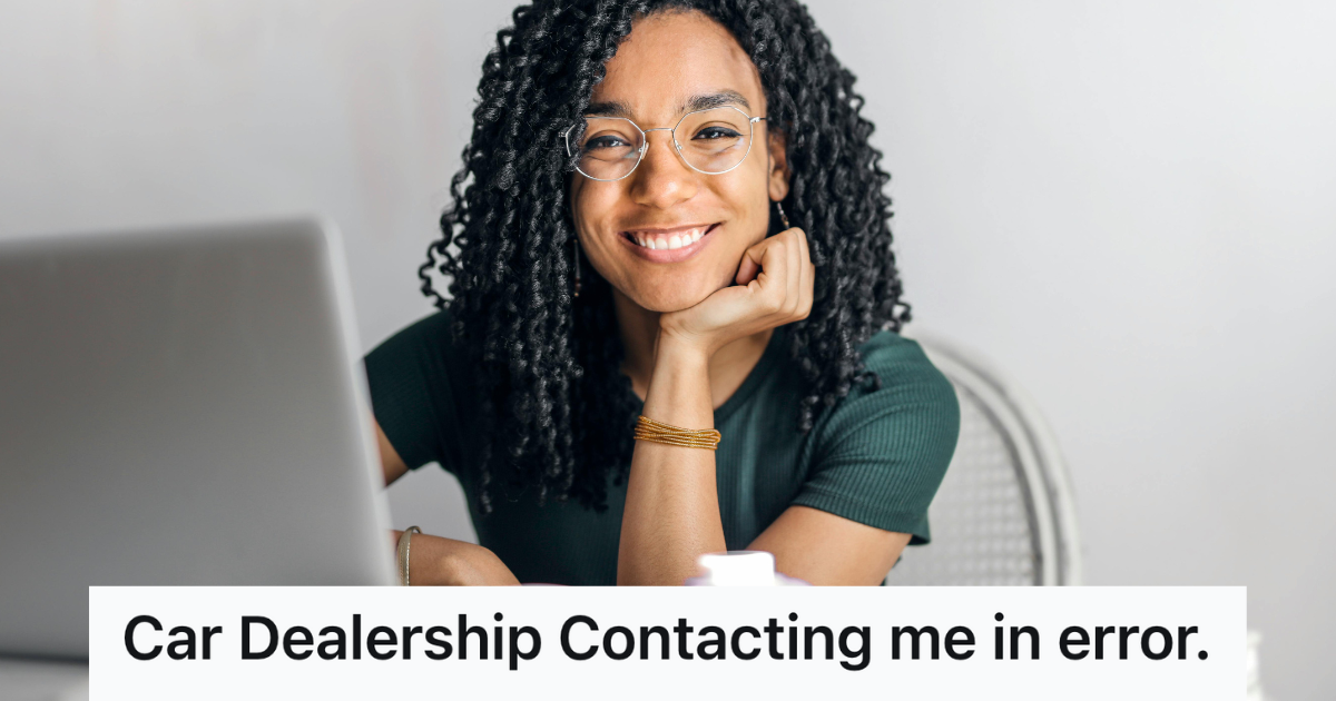 woman smiling at her computer