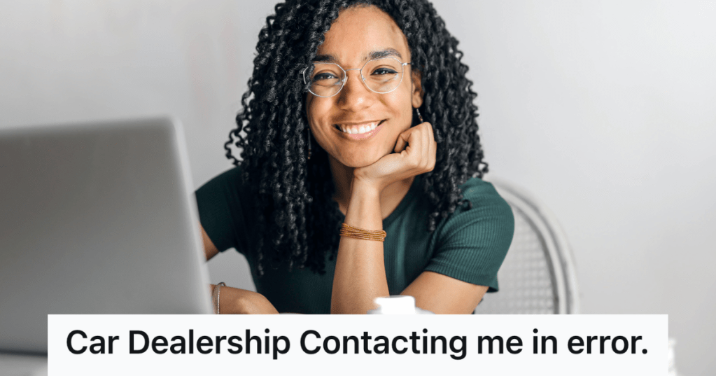 woman smiling at her computer