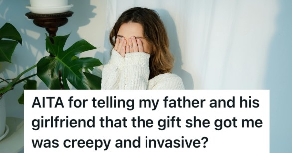 A woman covering her face with her hands