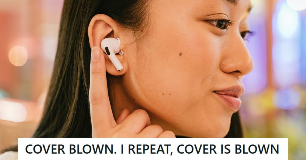 Woman wearing an earpiece while picking up donuts for breakfast