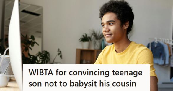 Teenage boy doing his school work at a computer