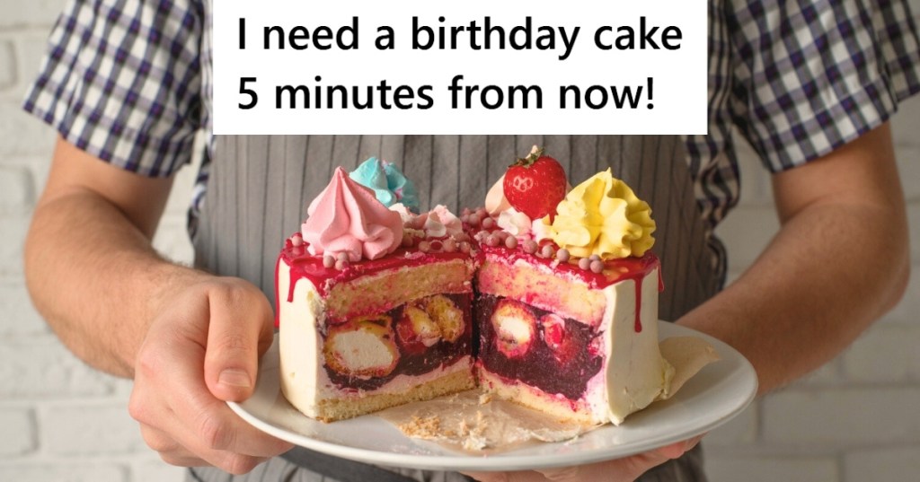 Male hands holding decorated cake