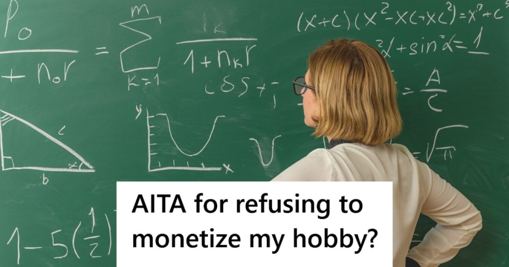 Girl observing math problems on blackboard