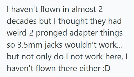 Headphones Sleep Deprived Traveler Browsed USB Cables At Heathrow, But When A Woman Mistook Him For An Employee And Asked About Headphones, He Accidentally Gave A Full Tutorial