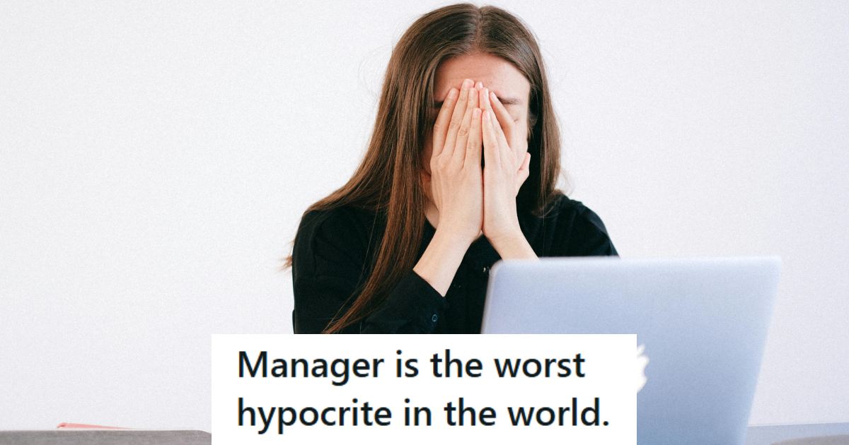 Woman who is stressed out and covering her face at her Apple Computer