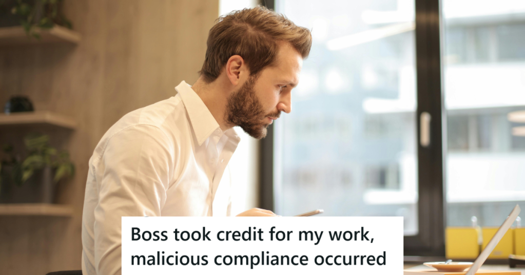Man in white shirt working on his desk