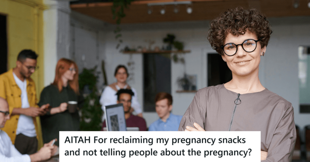 woman with curly hair standing in front of her team in office