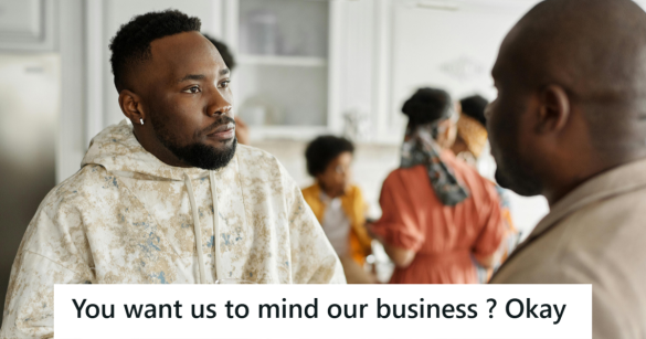 Two men talking in a kitchen