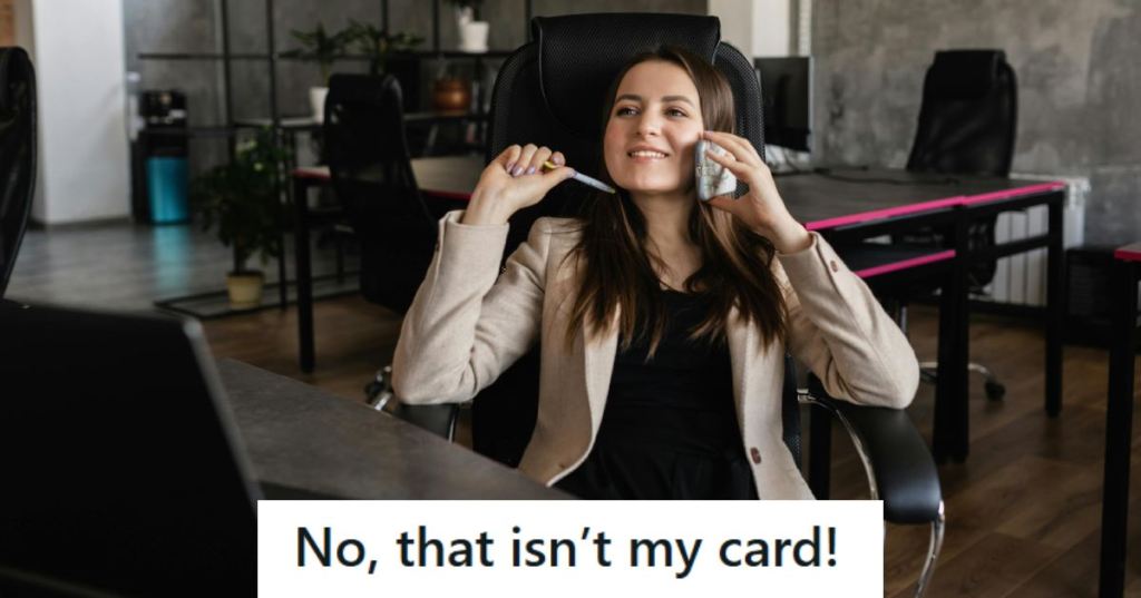 Retail manager sitting on the phone to a customer about her debit card