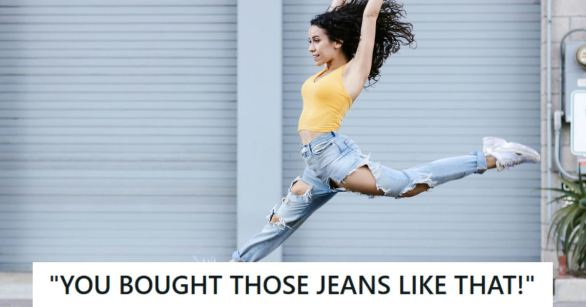Woman wearing very ripped jeans as she runs down the street