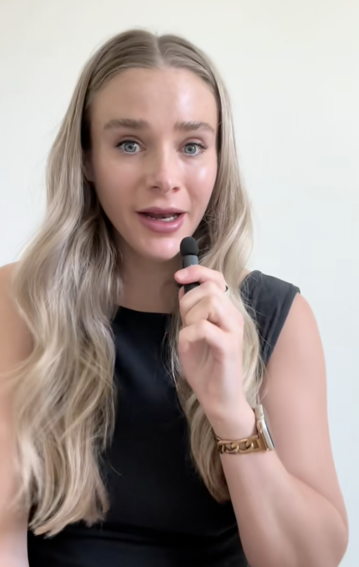 woman talking on a microphone