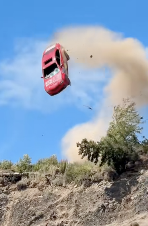car driving off a cliff