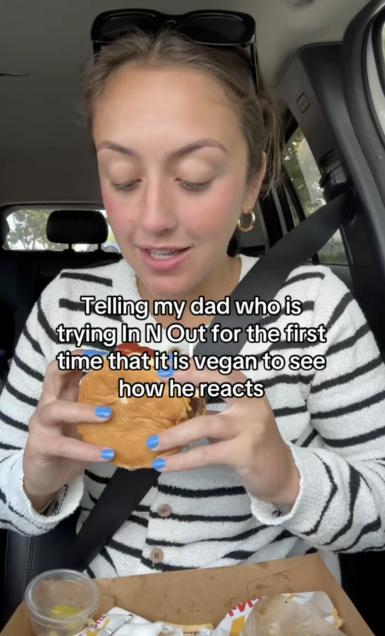 woman eating a burger