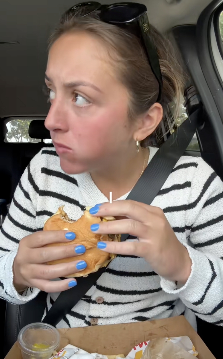 woman sitting in a car