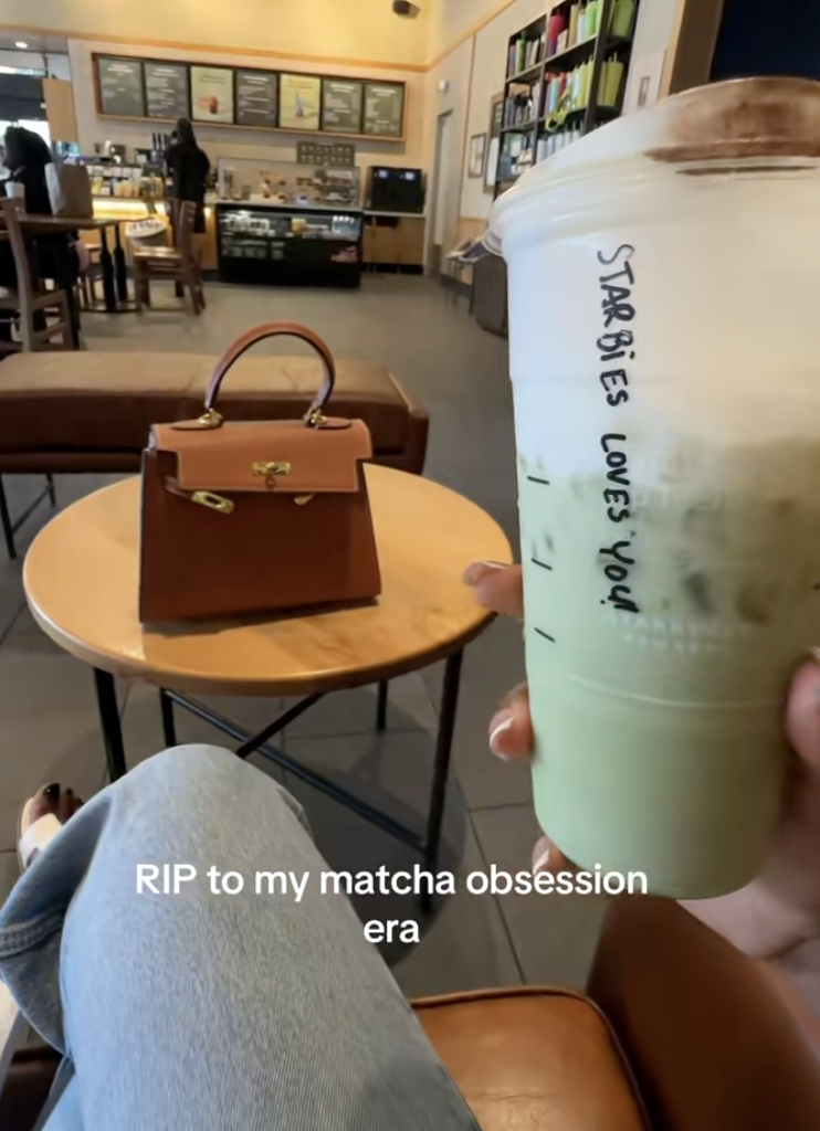 woman holding a cup of coffee