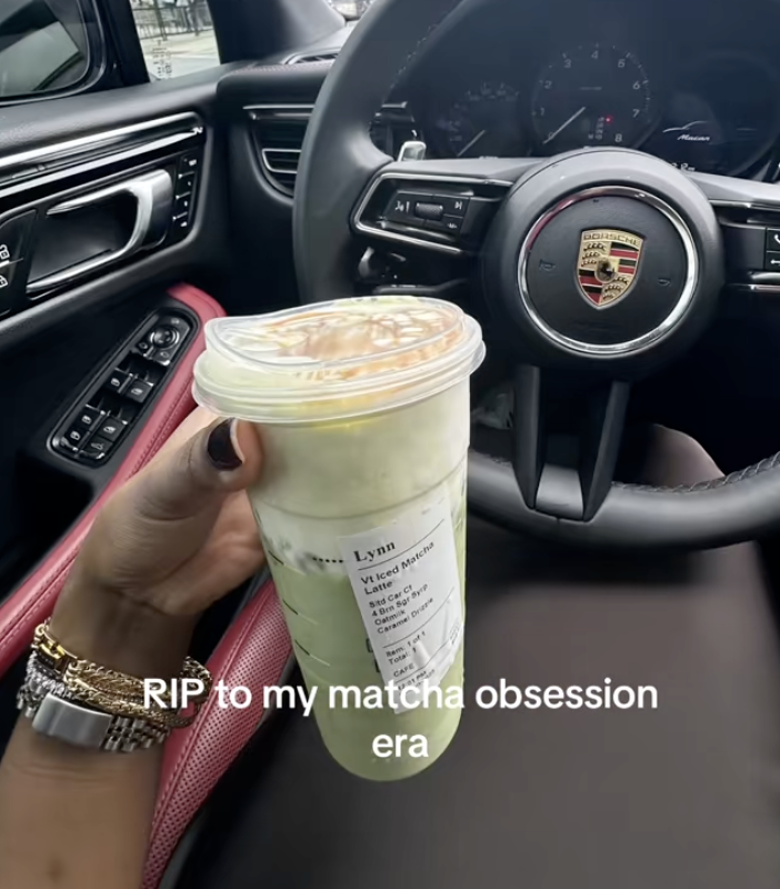 woman holding a cup of coffee