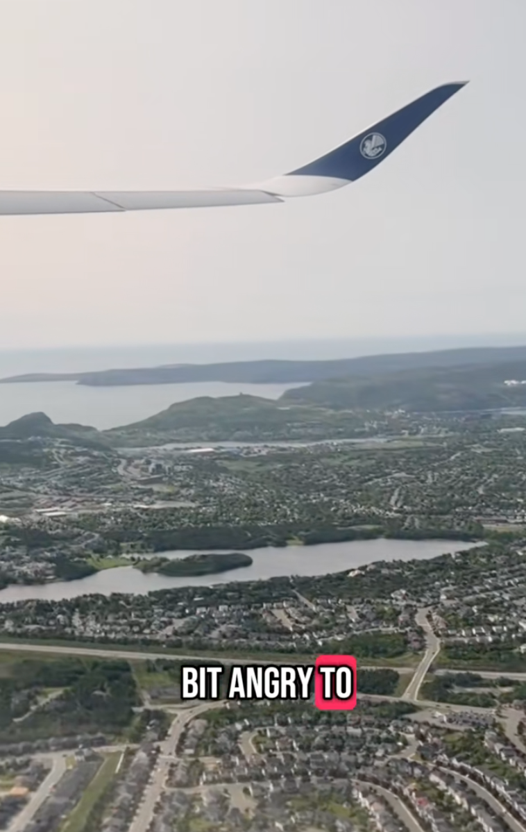 looking out the window of a plane