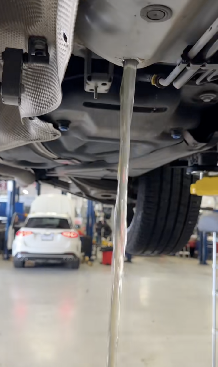water being drained from a car