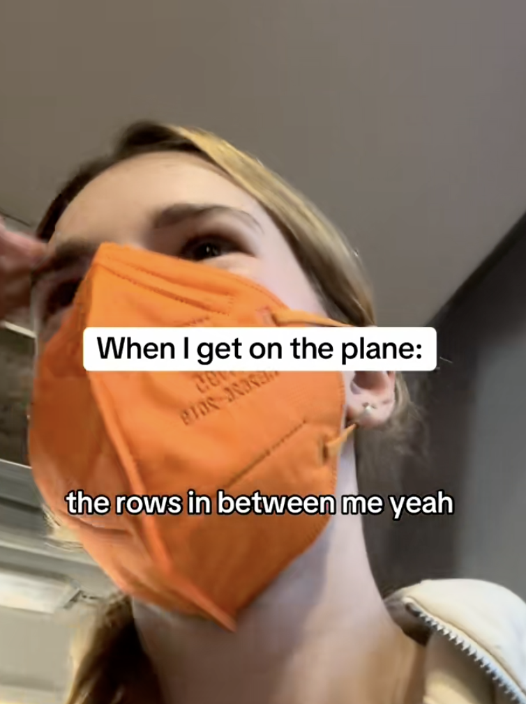 woman wearing a mask