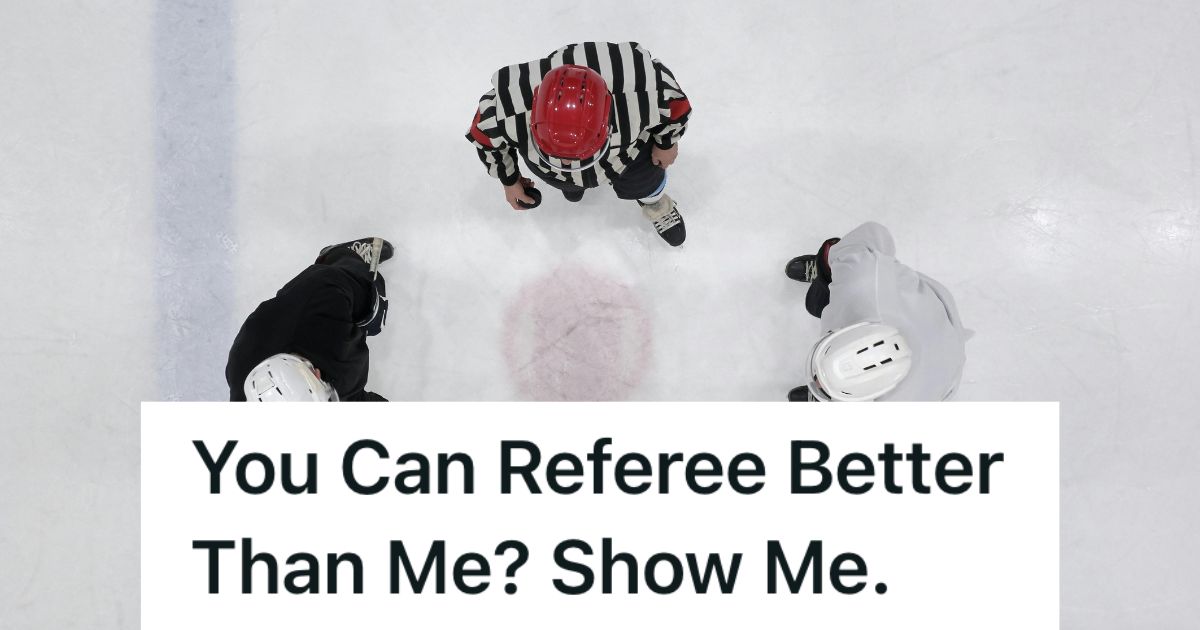Referee and two players on a hockey rink