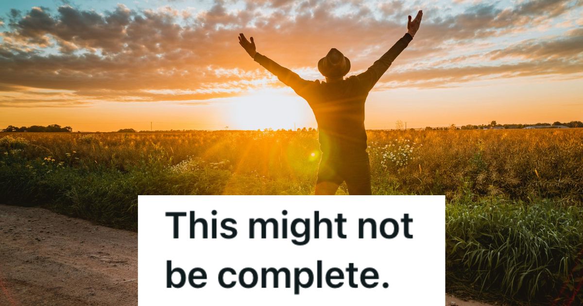 Man with his arms out facing a farm field