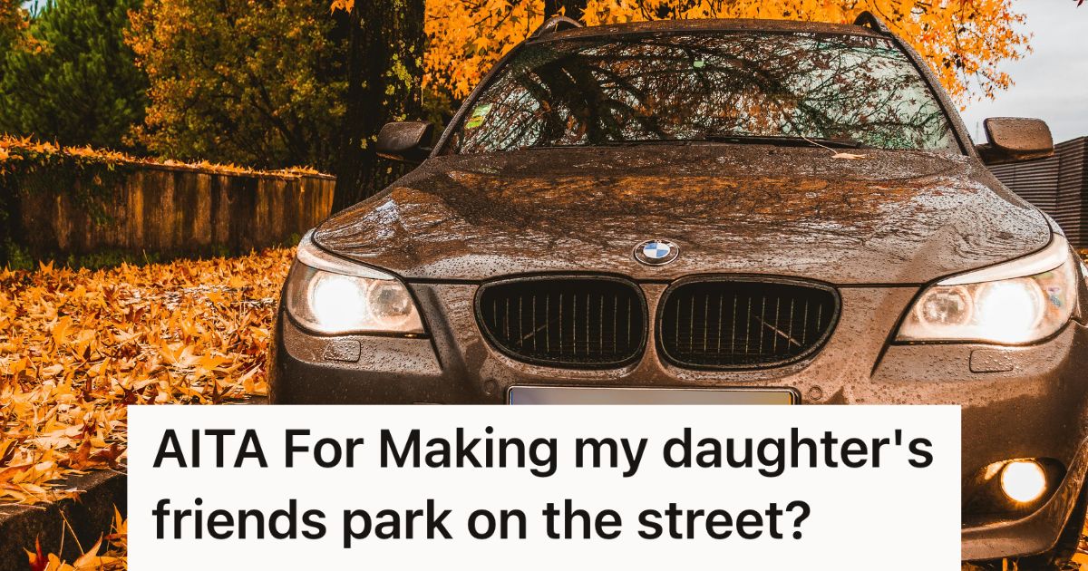 SUV parked on the street surrounded by fallen leaves