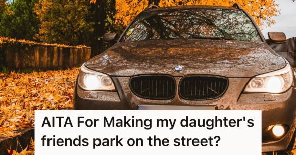 SUV parked on the street surrounded by fallen leaves